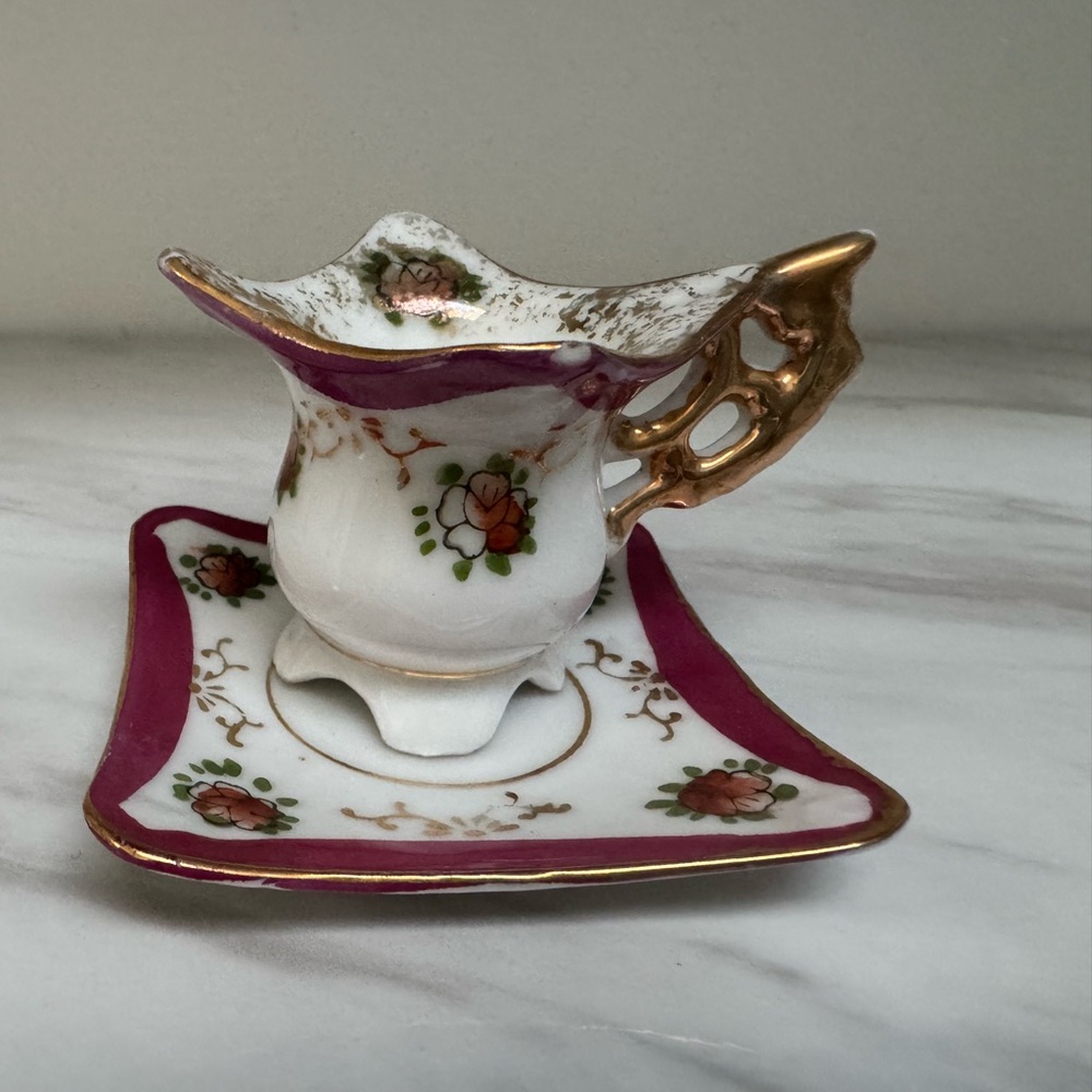 Antique  Miniature Porcelain Cup and Saucer.